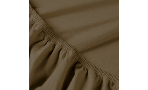 Rebeka elasztikus jersey lepedő brownie színben, kitűnő minőségű pamutból, körben gumis rögzítéssel.