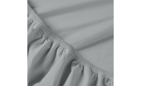 Rebeka elasztikus jersey lepedő mákos mousse színben, kitűnő minőségű pamutból, körben gumis rögzítéssel.