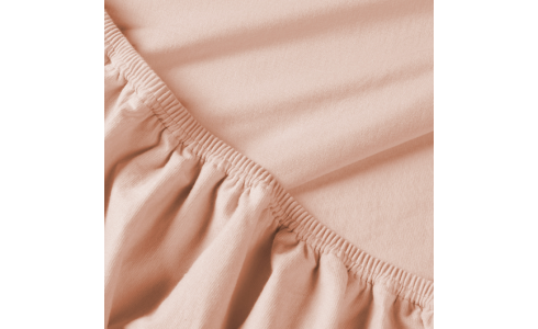Rebeka elasztikus jersey lepedő epres krémes színben, kitűnő minőségű pamutból, körben gumis rögzítéssel.
